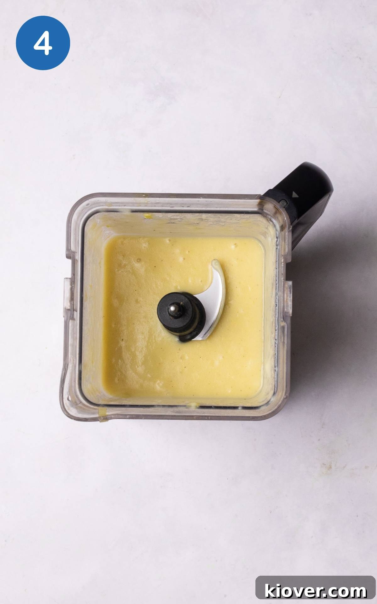 blending ingredients for leek and potato soup in a blender.