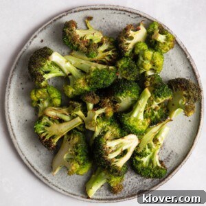 71 Top Gluten-Free Recipes for Every Meal 73 overhead shot of broccoli on grey plate.