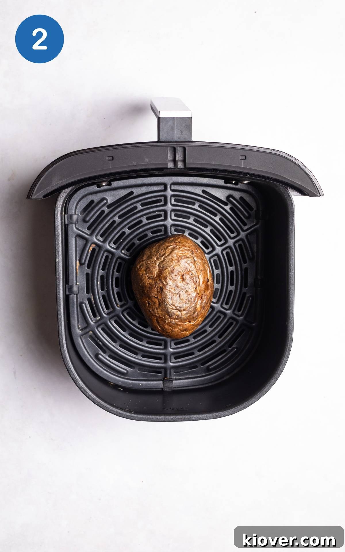 Crispy Air Fryer Jacket Potato Recipe for Perfect Baked Potatoes 5 jacket potato in an air fryer.