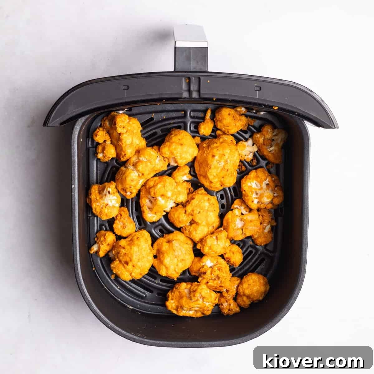 Crispy Air Fryer Cauliflower Recipe for a Perfect Side Dish 2 Cauliflower in an air fryer.