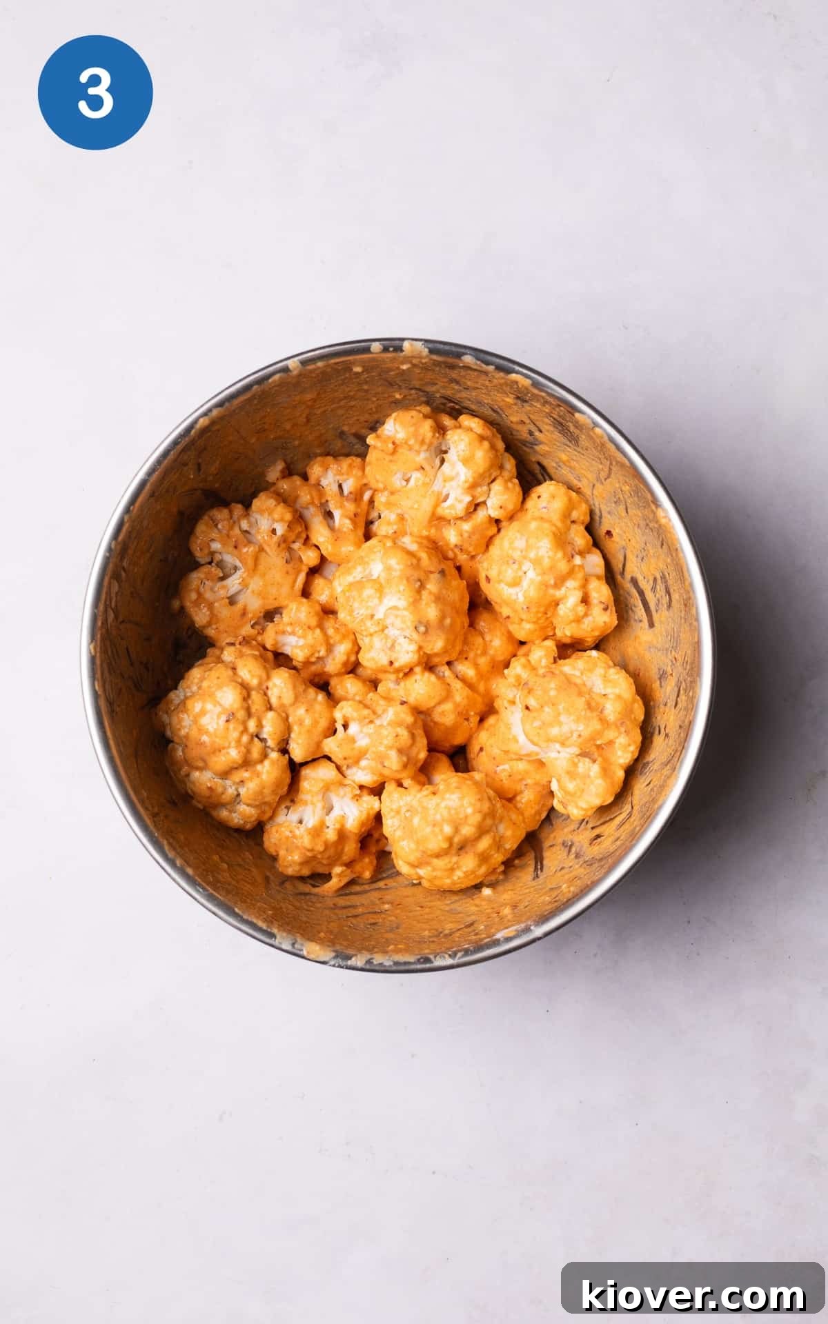 Crispy Air Fryer Cauliflower Recipe for a Perfect Side Dish 6 cauliflower florets mixed with the spices and flour.