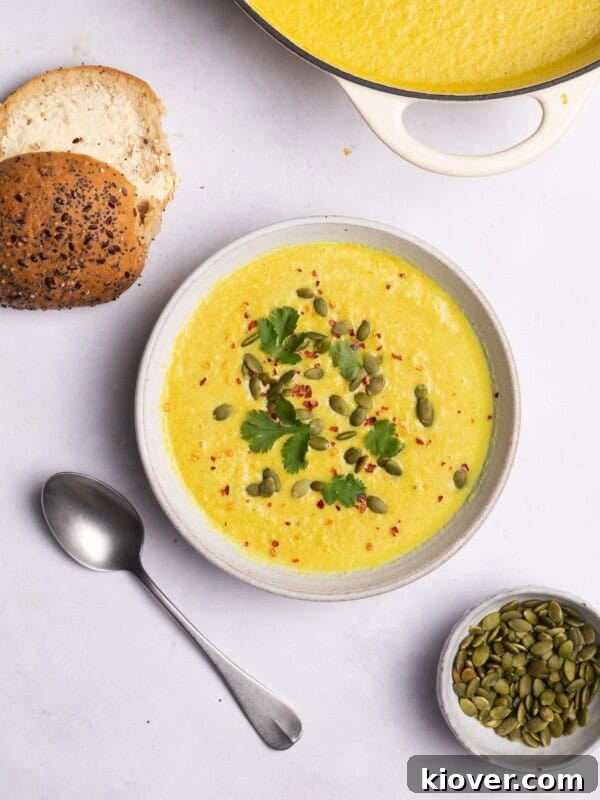 Crispy Air Fryer Cauliflower Recipe for a Perfect Side Dish 8 cauliflower soup served with bread rolls and pumpkin seeds.