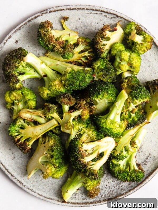 Crispy Air Fryer Cauliflower Recipe for a Perfect Side Dish 10 Air Fryer Broccoli on a grey plate.