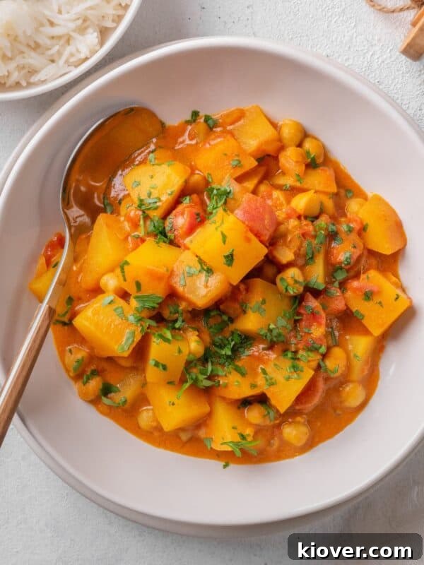 Creamy Spiced Eggplant Curry Recipe for Flavorful Weeknight Meals 12 Potato Curry served on a plate.