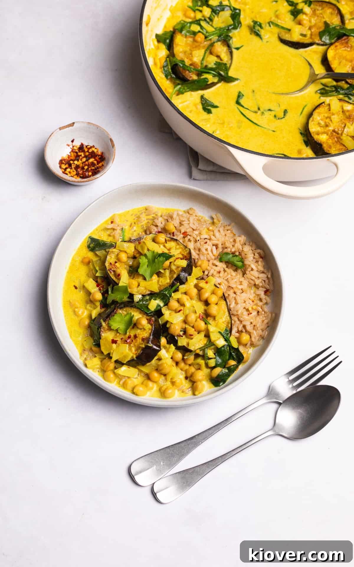 Creamy Spiced Eggplant Curry Recipe for Flavorful Weeknight Meals 9 aubergine curry with spinach served with brown rice.