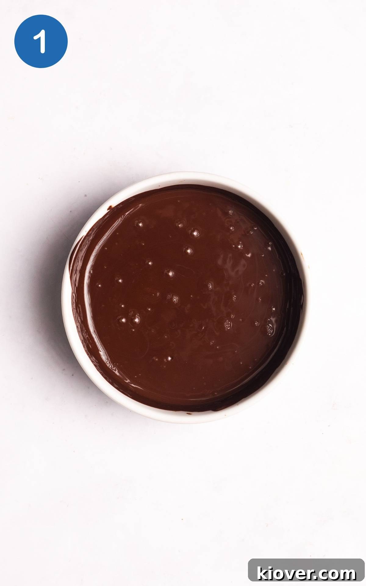 Creamy Vegan Chocolate Mousse Recipe for Decadent Desserts 4 melted dark chocolate in a bowl.
