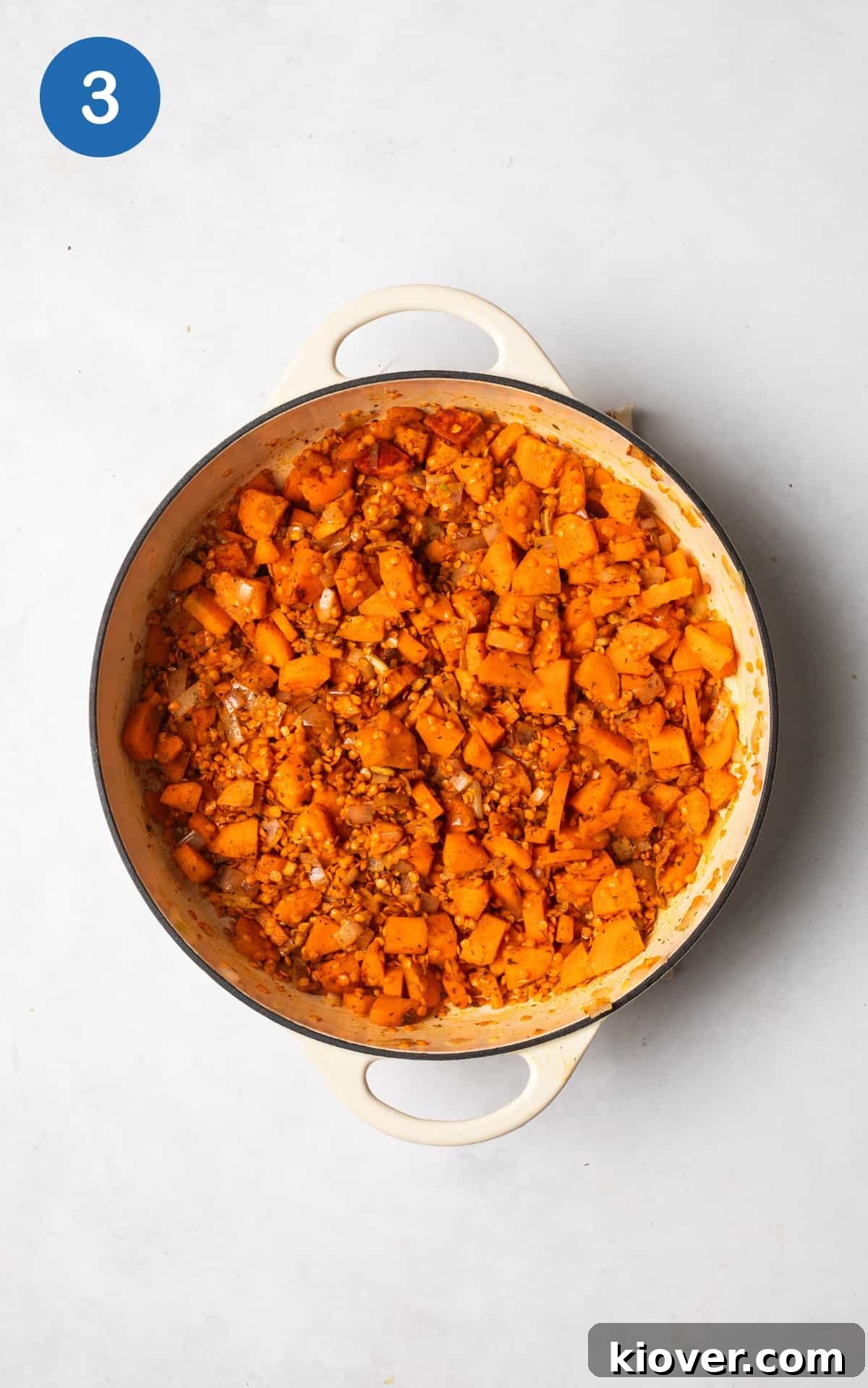 Hearty Carrot and Red Lentil Soup with Warm Spices 6 colorful vegetables in a pot.