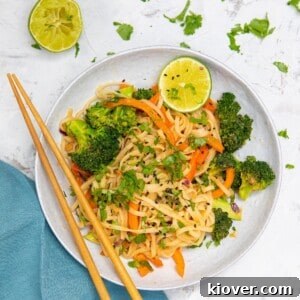 43 Gluten-Free Vegan Recipes for Everyday Meals and Desserts 24 peanut butter noodles with vegetables in a bowl.