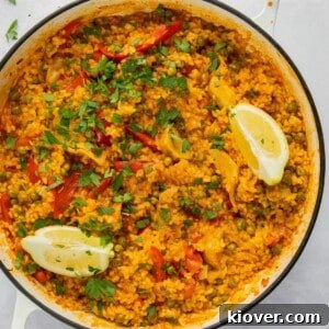 43 Gluten-Free Vegan Recipes for Everyday Meals and Desserts 25 overhead shot of paella in large white pan