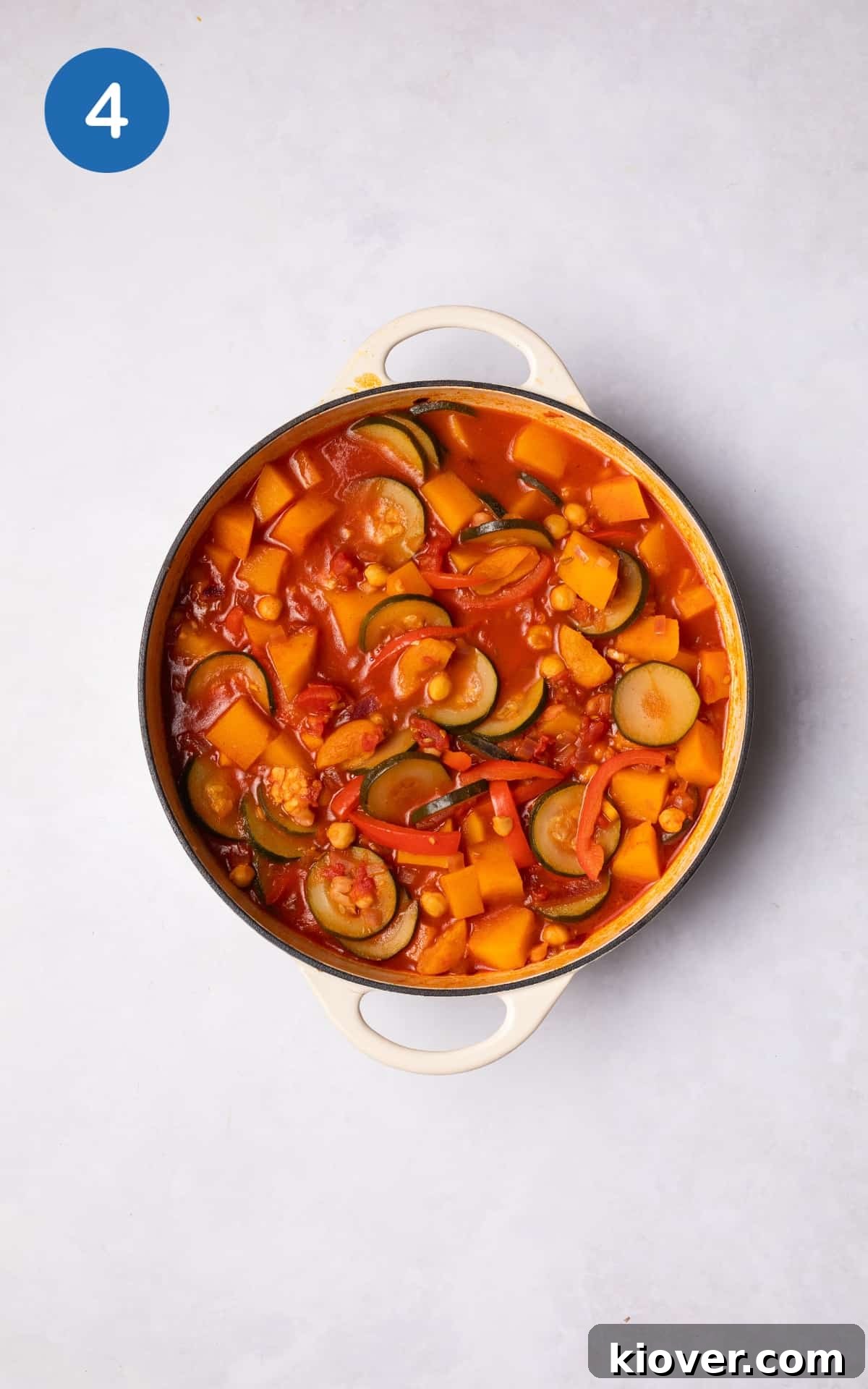 Moroccan Vegetable Tagine Recipe: Flavorful Slow-Cooked Veg Stew 7 Colorful Vegetable Tagine in a cooking pot.