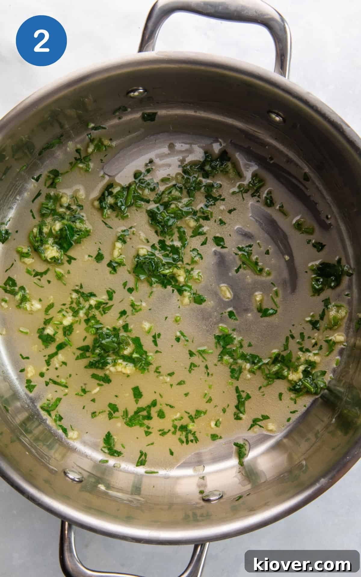 melted butter, garlic, and parsley in a pan.