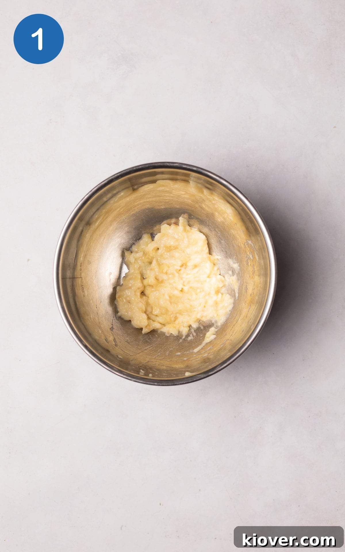 Creamy Baked Oats Recipe for Breakfast and Meal Prep 4 mashed banana in a bowl.