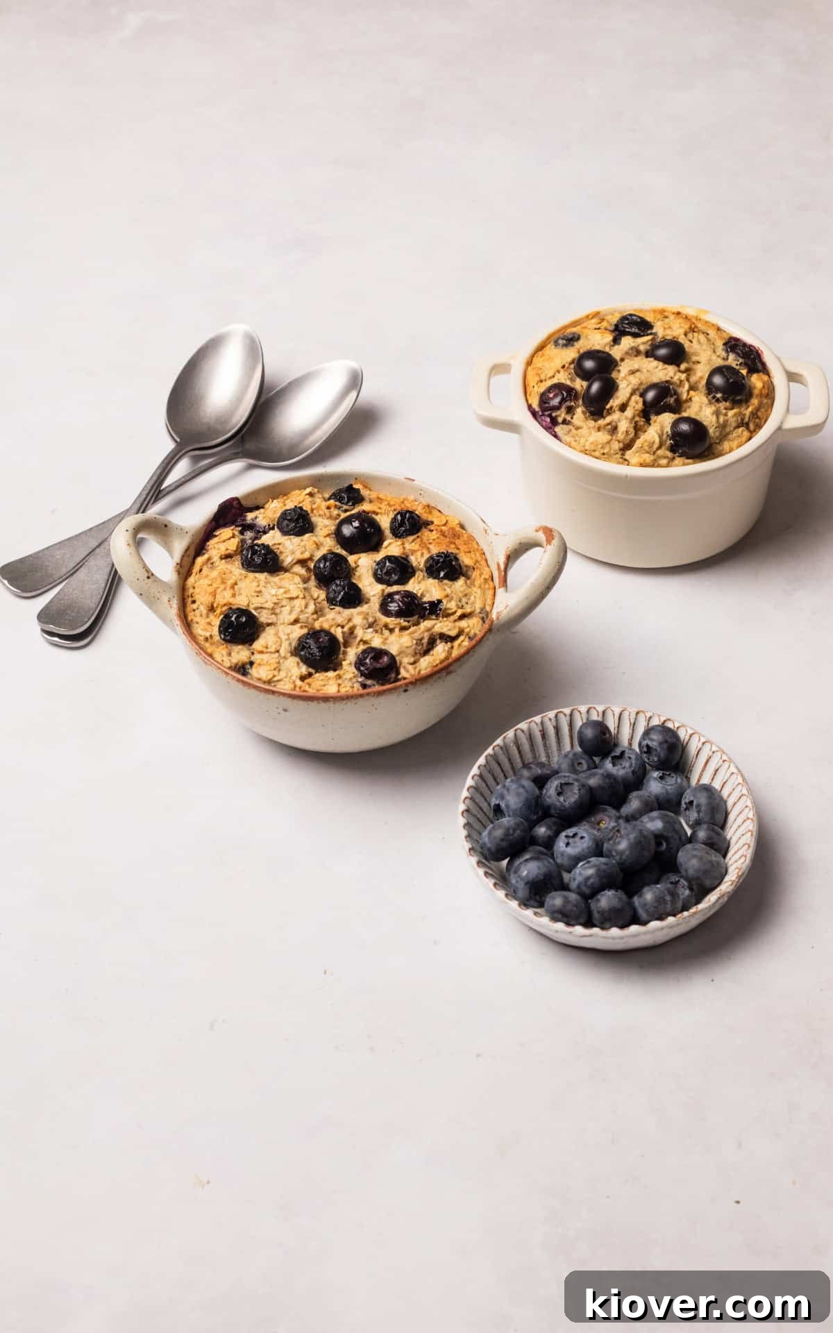 Creamy Baked Oats Recipe for Breakfast and Meal Prep 8 banana baked oatmeal with blueberries.