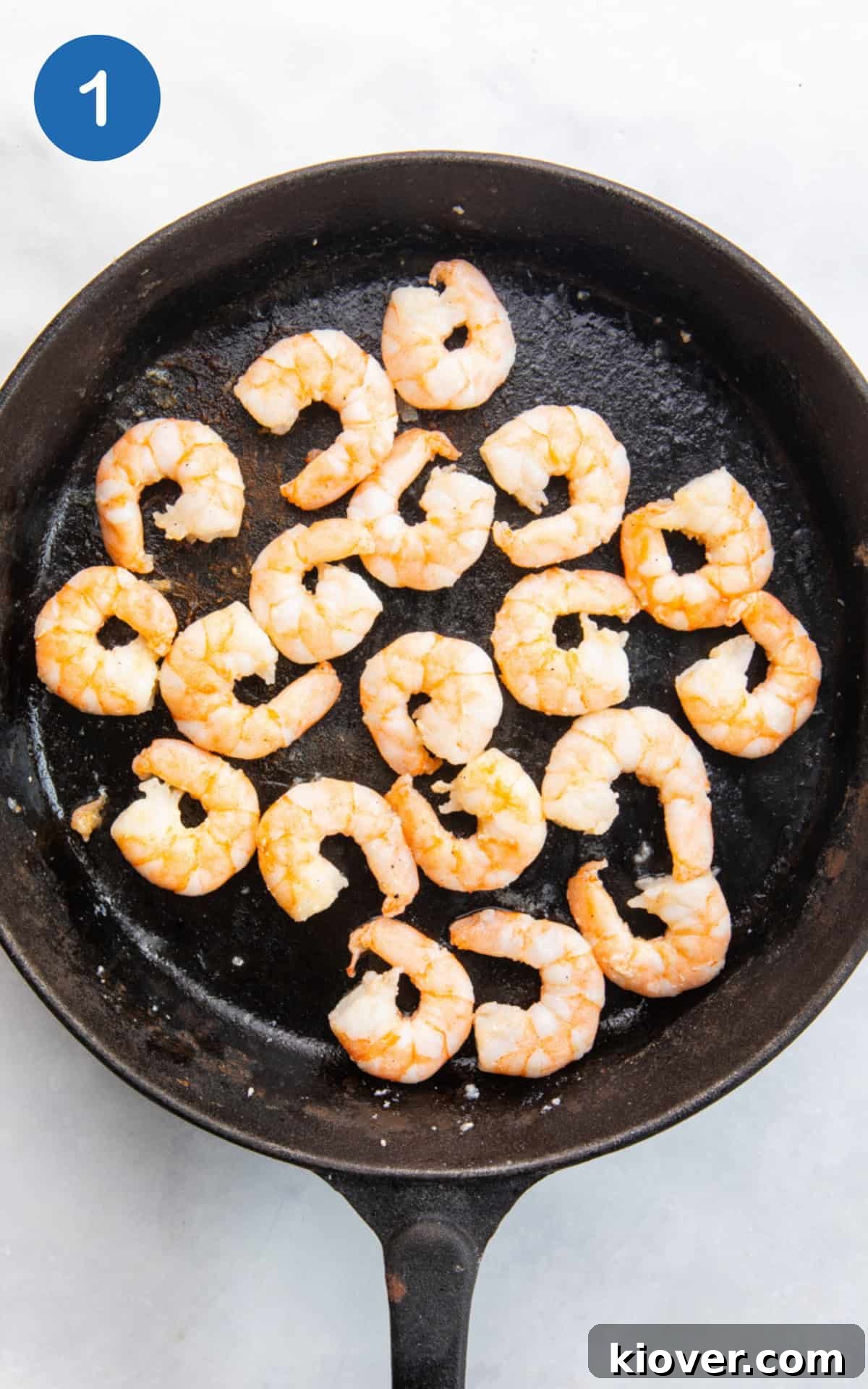 Zesty Prawn Salad with Lemon-Dill Dressing 4 frying prawns in a pan.