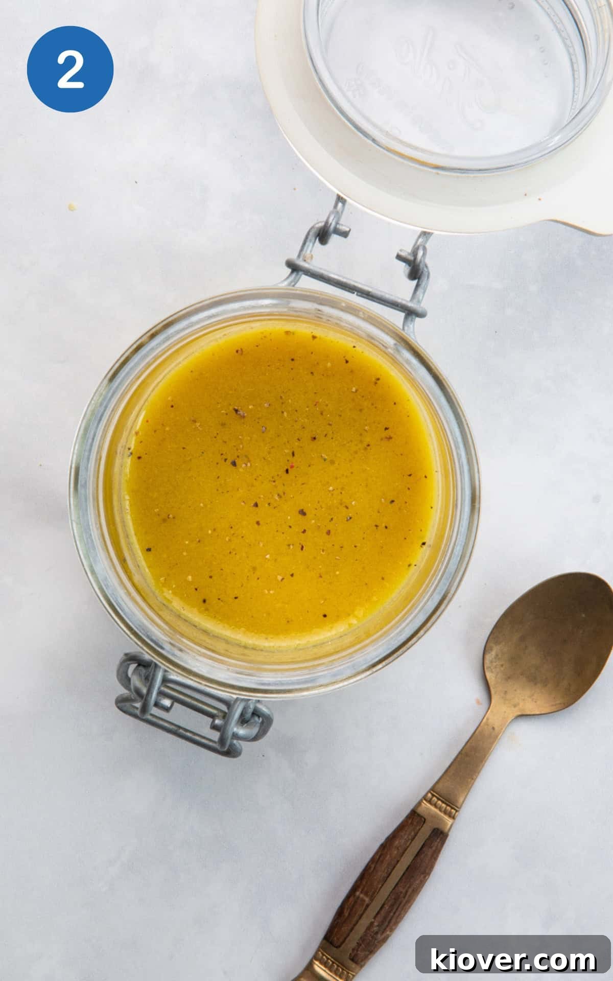 Zesty Prawn Salad with Lemon-Dill Dressing 5 maple dijon salad dressing in a glass jar.