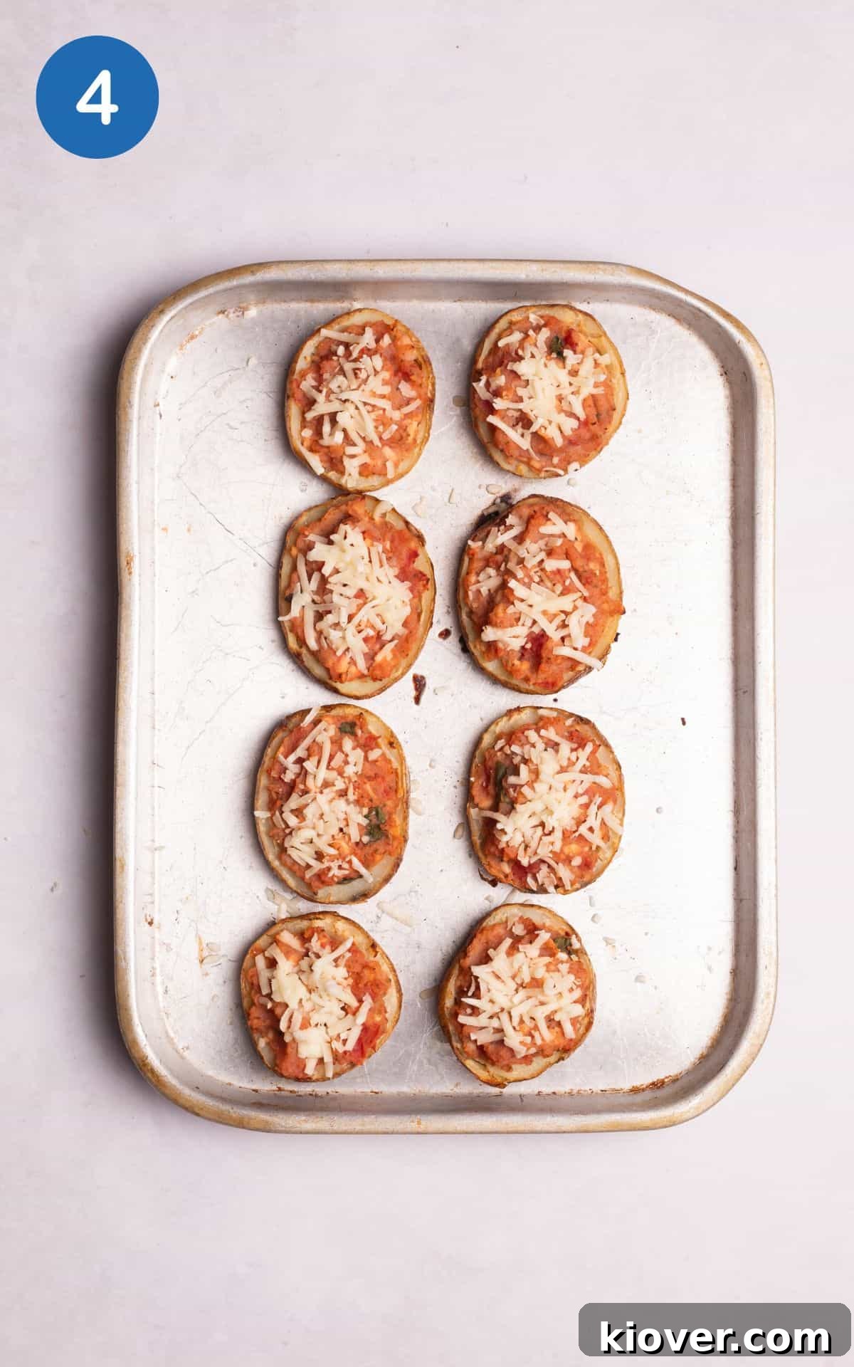 potato shells stuffed with the mixture and topped with mozzarella cheese.