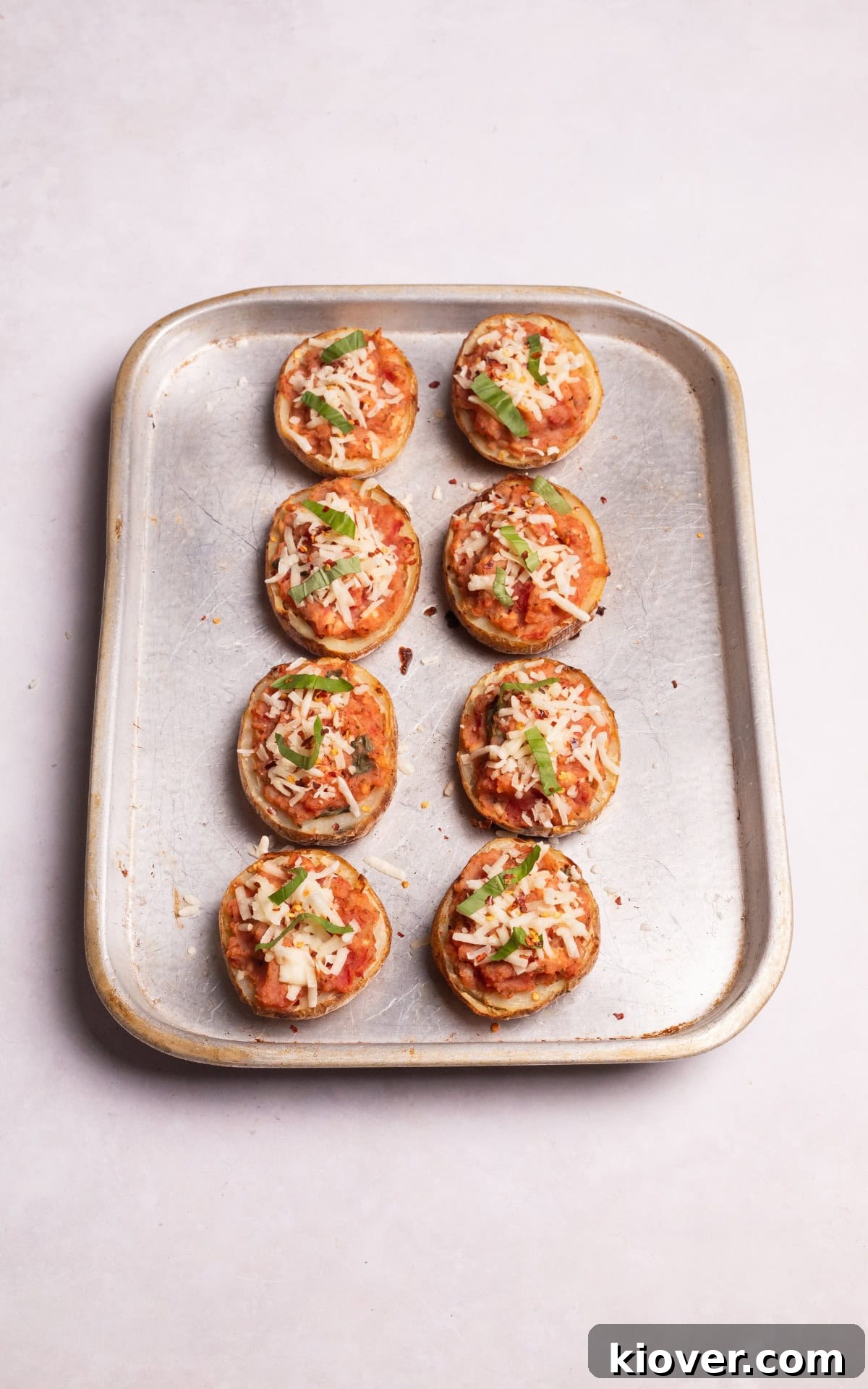 stuffed potato skins with dairy free mozzarella on top.