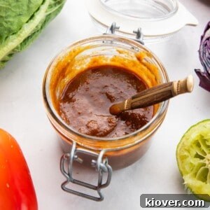 salad dressing with peanut butter in a glass jar.