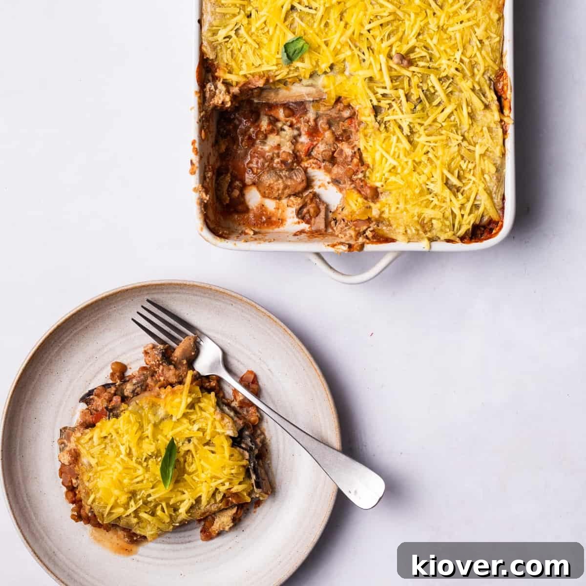 Vegan Greek Moussaka Recipe: Creamy Eggplant and Lentil Bake 2 Vegan Moussaka served on a plate.