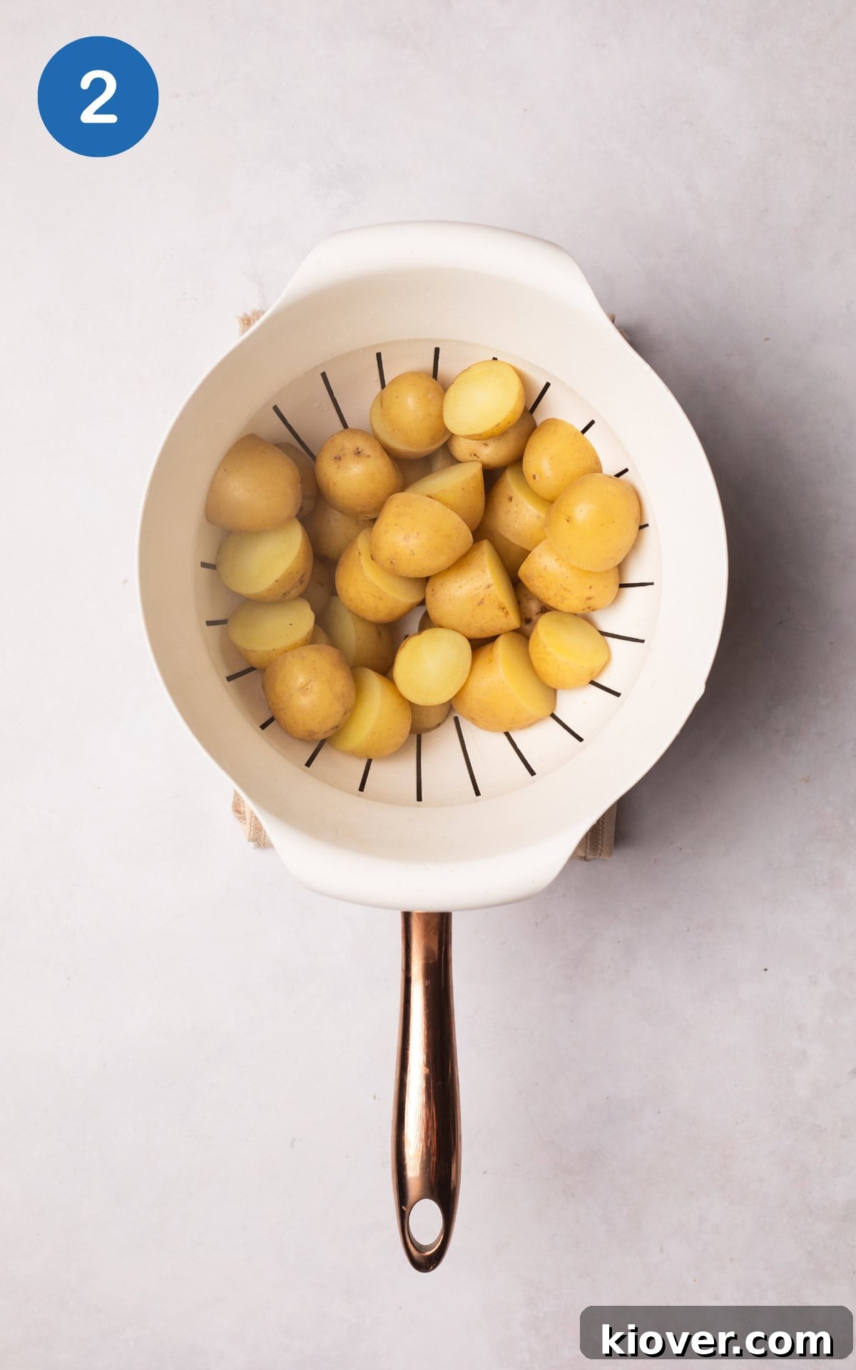 baby potatoes in a strainer.