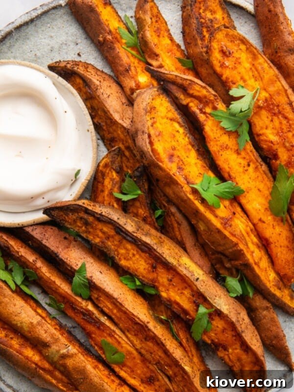 air fryer sweet potato wedges served with a dip.