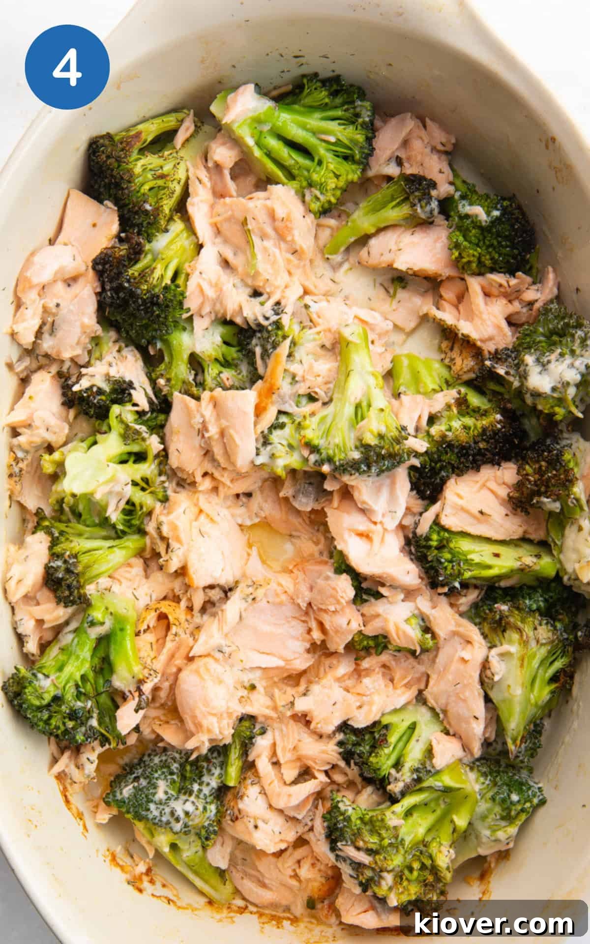 Creamy Salmon & Broccoli Pasta Recipe for Weeknight Dinners 7 mixing salmon, broccoli and cream cheese.