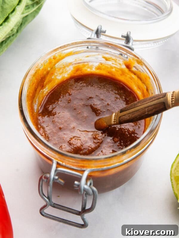 salad dressing with peanut butter in a glass jar.