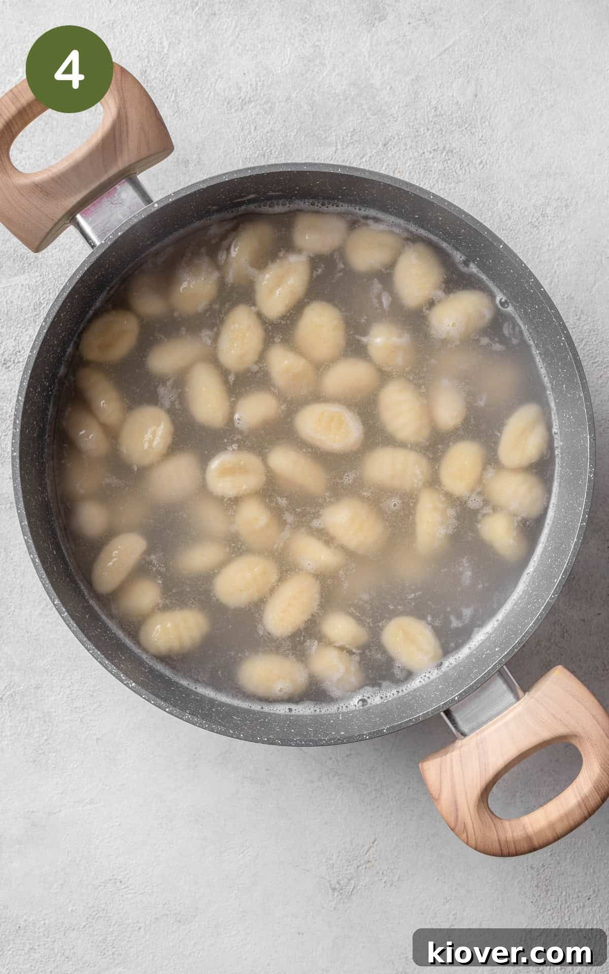 Creamy Baked Gnocchi with Mozzarella and Tomato Sauce 7 Gnocchi boiling in a saucepan.