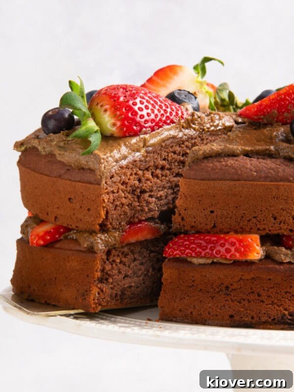 chocolate cake on to white cake stand
