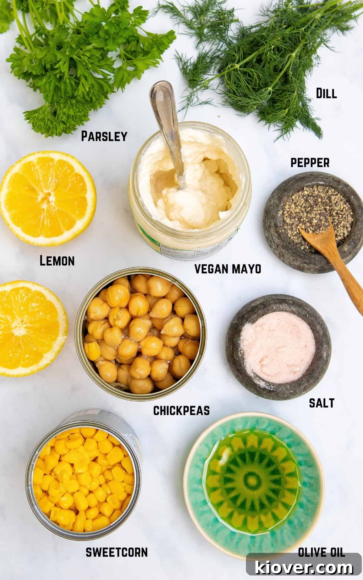 Chickpea and Tuna Salad Recipe for Meal Prep 3 the ingredients to make chickpea mayo salad against a white background.