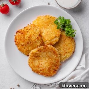 Crispy Swiss Potato Rösti Recipe — Golden Hash Brown Style 14 potato rosti served on a plate.