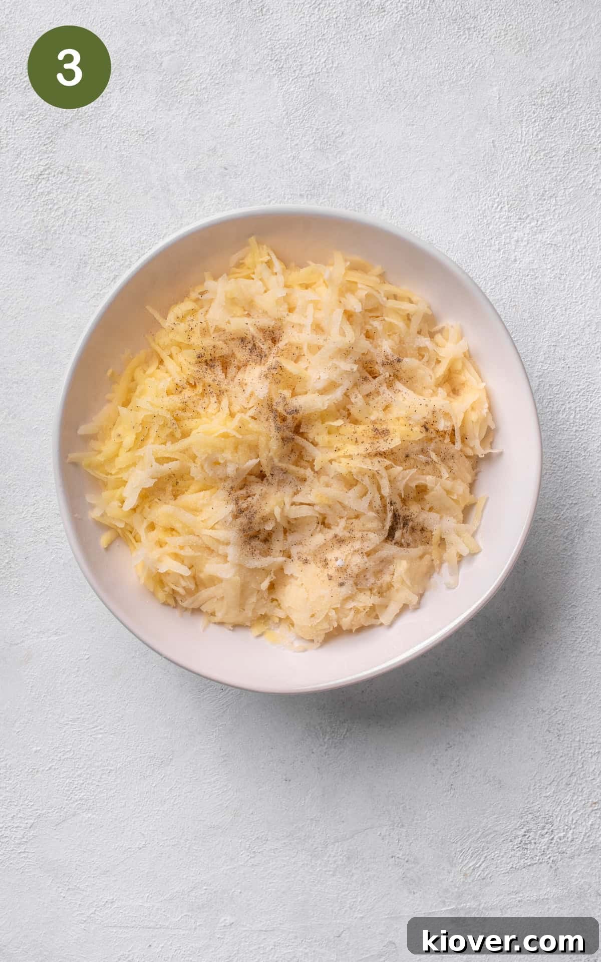 Crispy Swiss Potato Rösti Recipe — Golden Hash Brown Style 6 Adding 1 tablespoon of the melted butter to the grated potatoes,