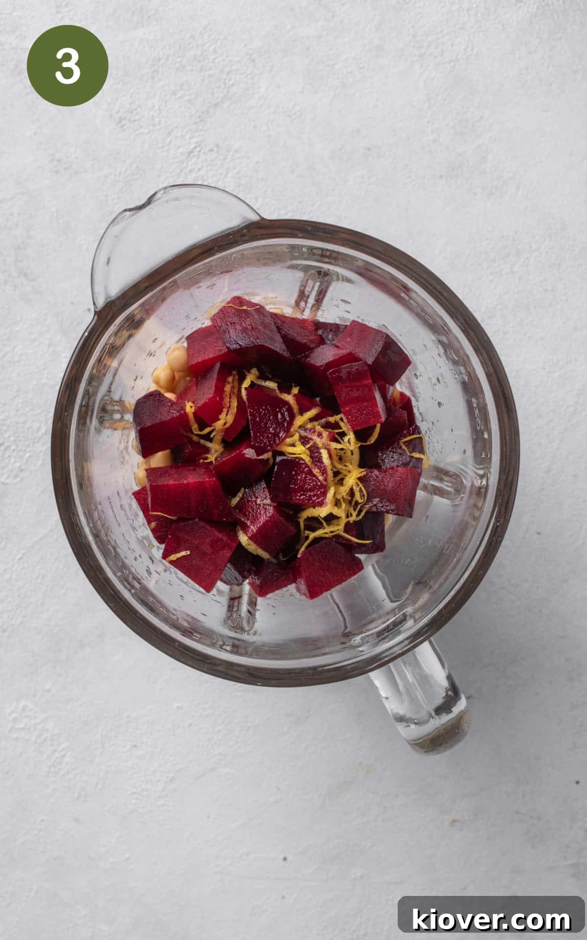 Vibrant Beetroot Hummus Recipe: Creamy & Flavorful Dip 6 chickpeas, roasted beet, tahini, garlic, coriander, cumin, and salt in a high-power food blender.