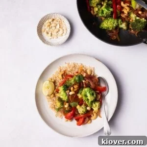Broccoli Stir Fry served on a plate with brown rice.