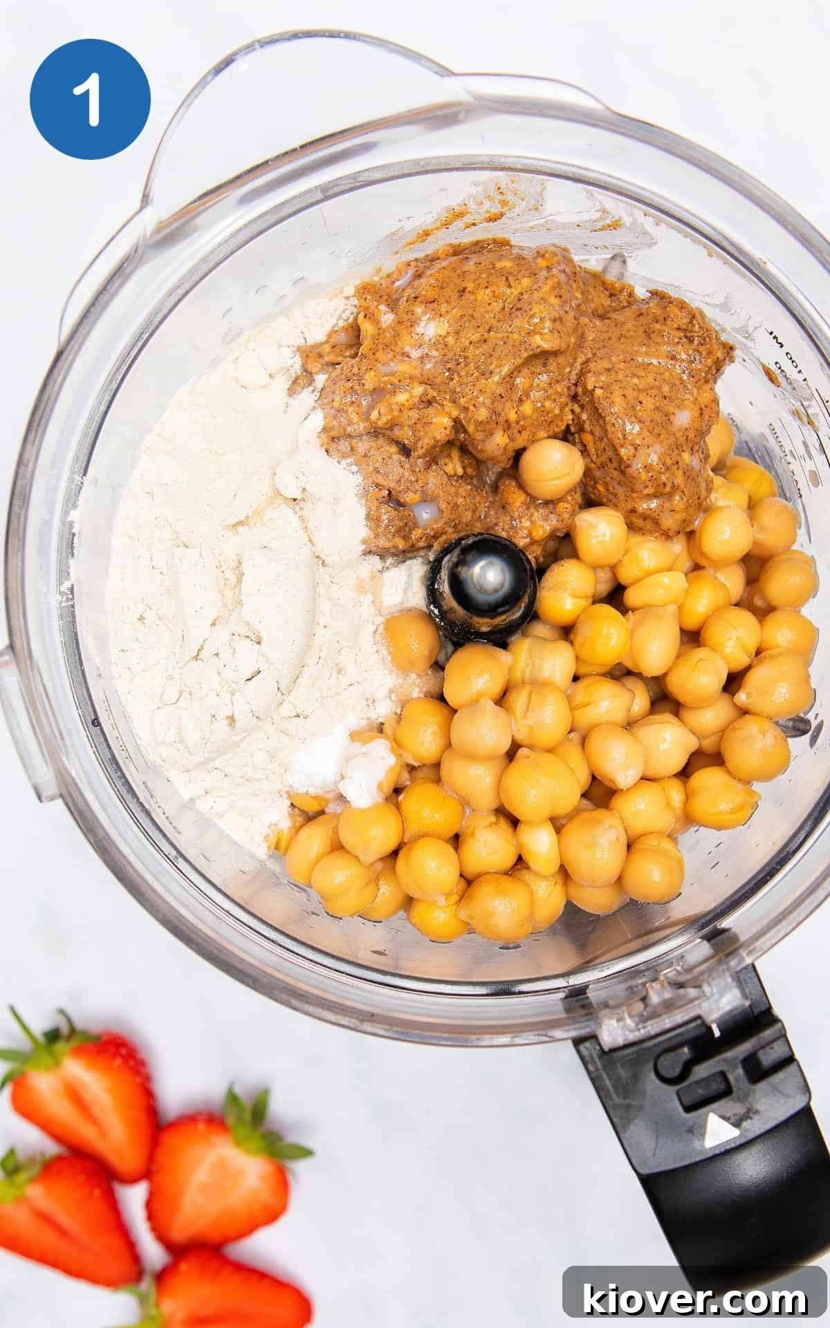 Chickpeas, flour and peanut butter in a food processor.