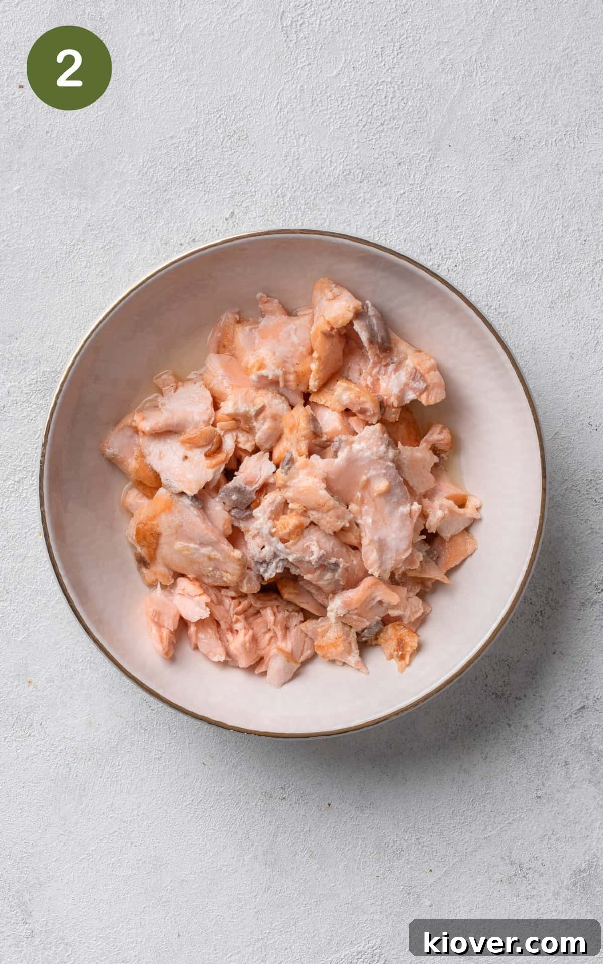 flaked salmon on a plate.