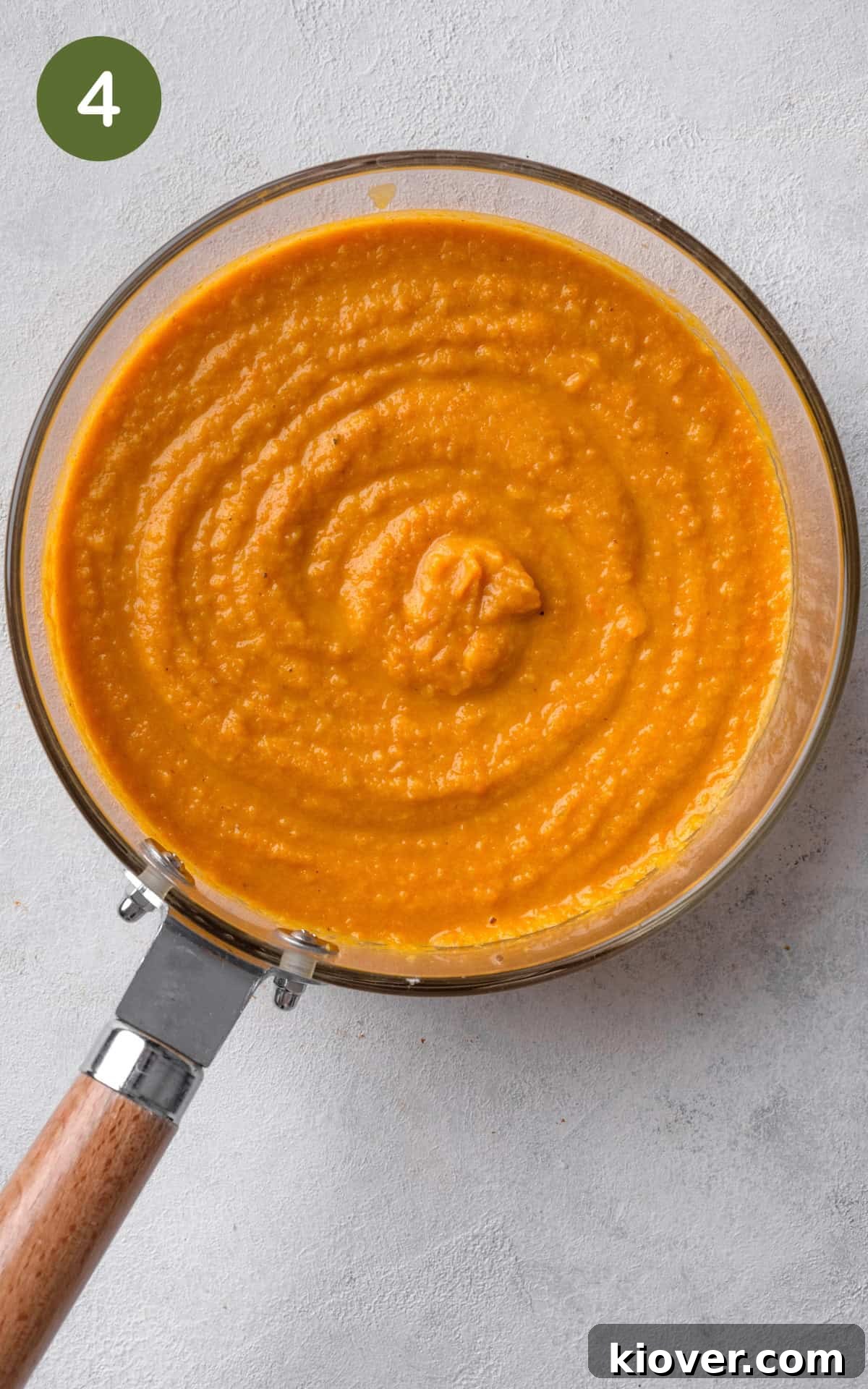 Creamy Carrot and Parsnip Soup Recipe for Cozy Weeknights 7 blended soup in a pot.