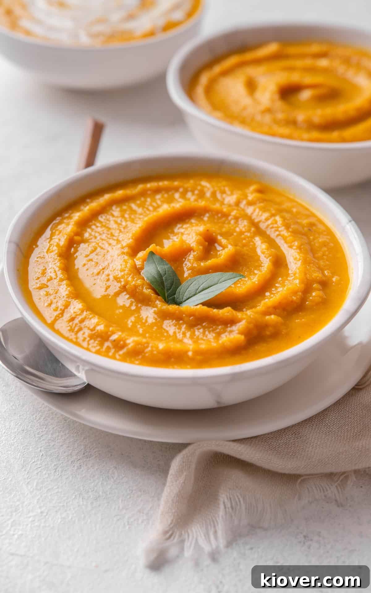 Creamy Carrot and Parsnip Soup Recipe for Cozy Weeknights 8 soup with carrots and parsnip in a bowl.