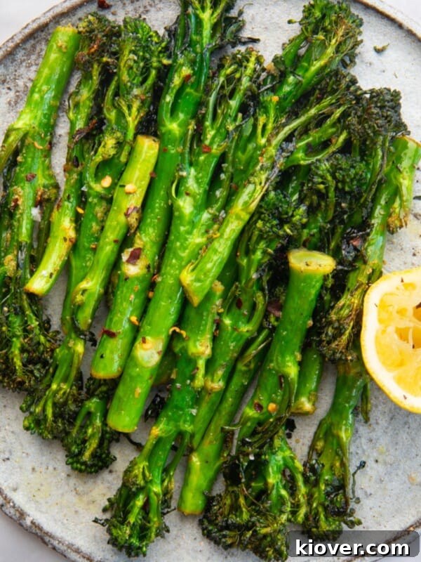 Creamy Broccoli Soup Recipe with Garlic and Cheddar 13 Air Fryer Tenderstem Broccoli served on a plate.