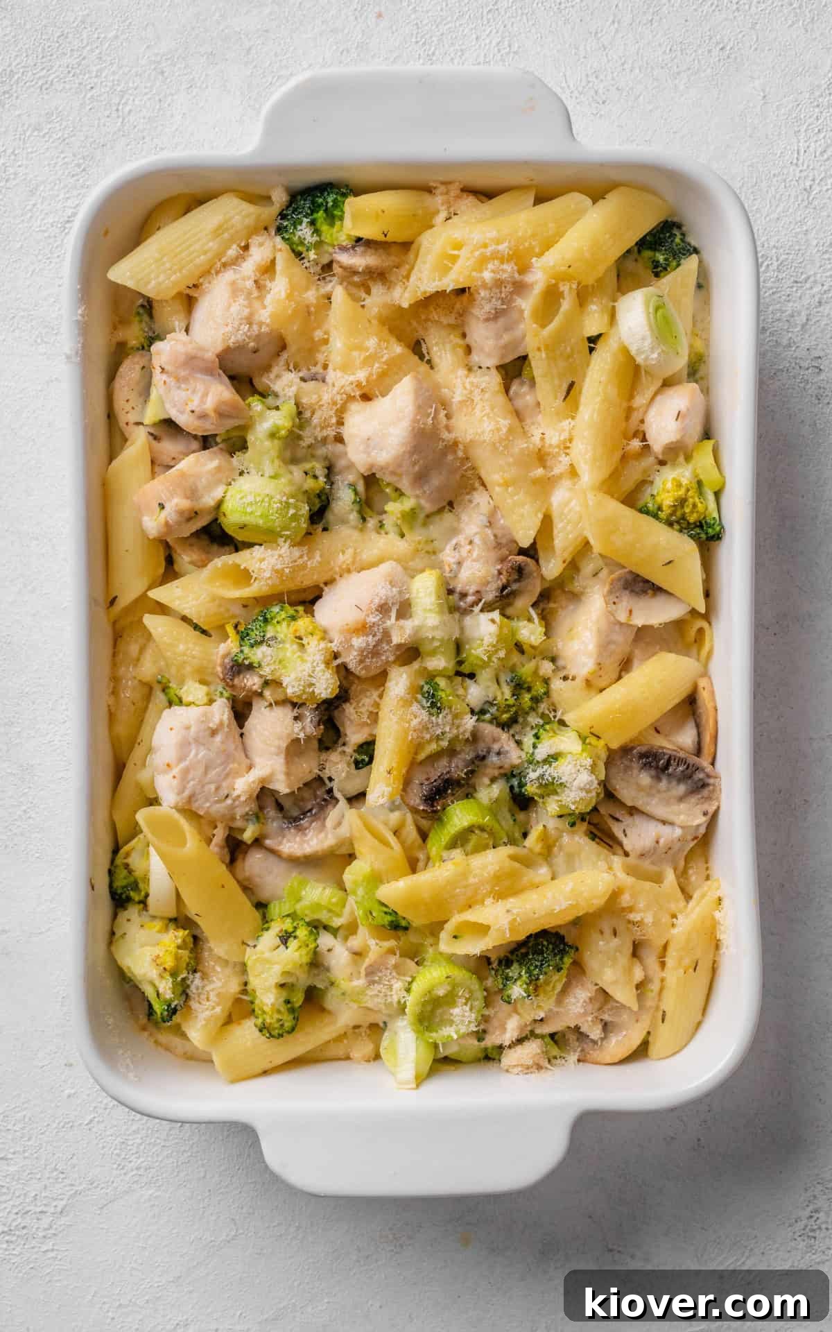 Creamy Chicken Pasta Bake with Melty Cheese and Herbs 11 pasta bake with chicken, broccoli, leek and mushrooms.