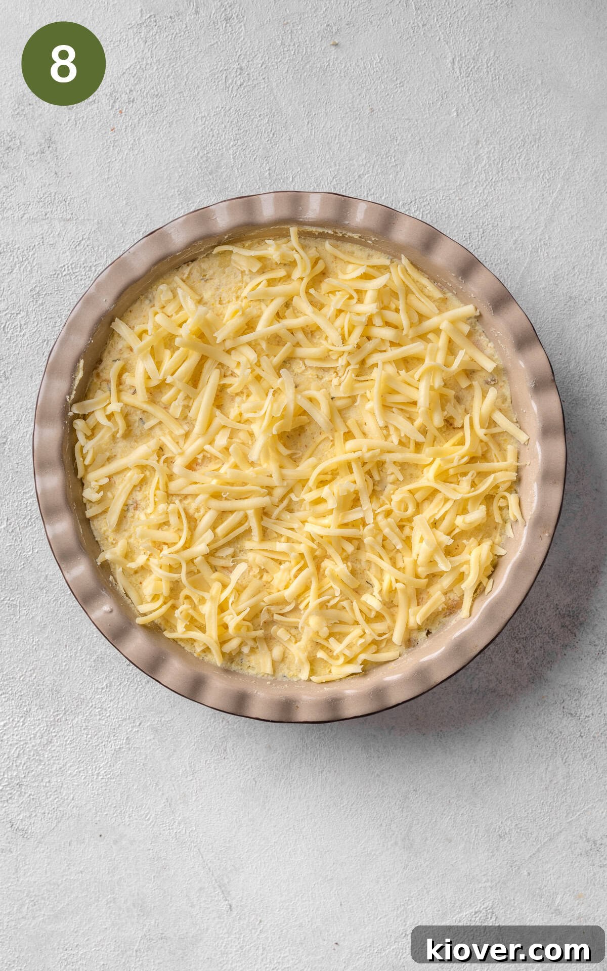 cheese and potato pie in a baking dish.