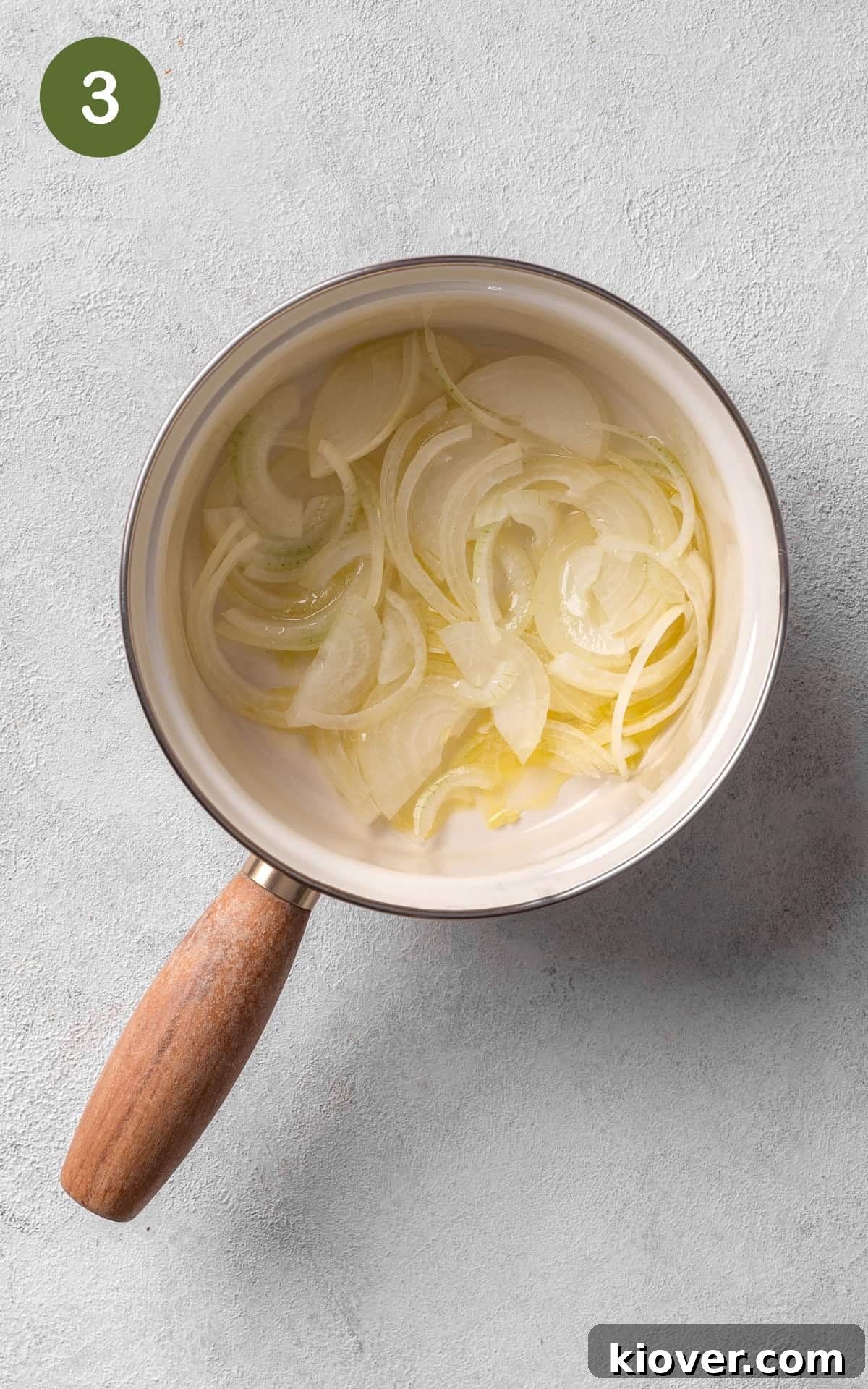 cooking onions in a saucepot.