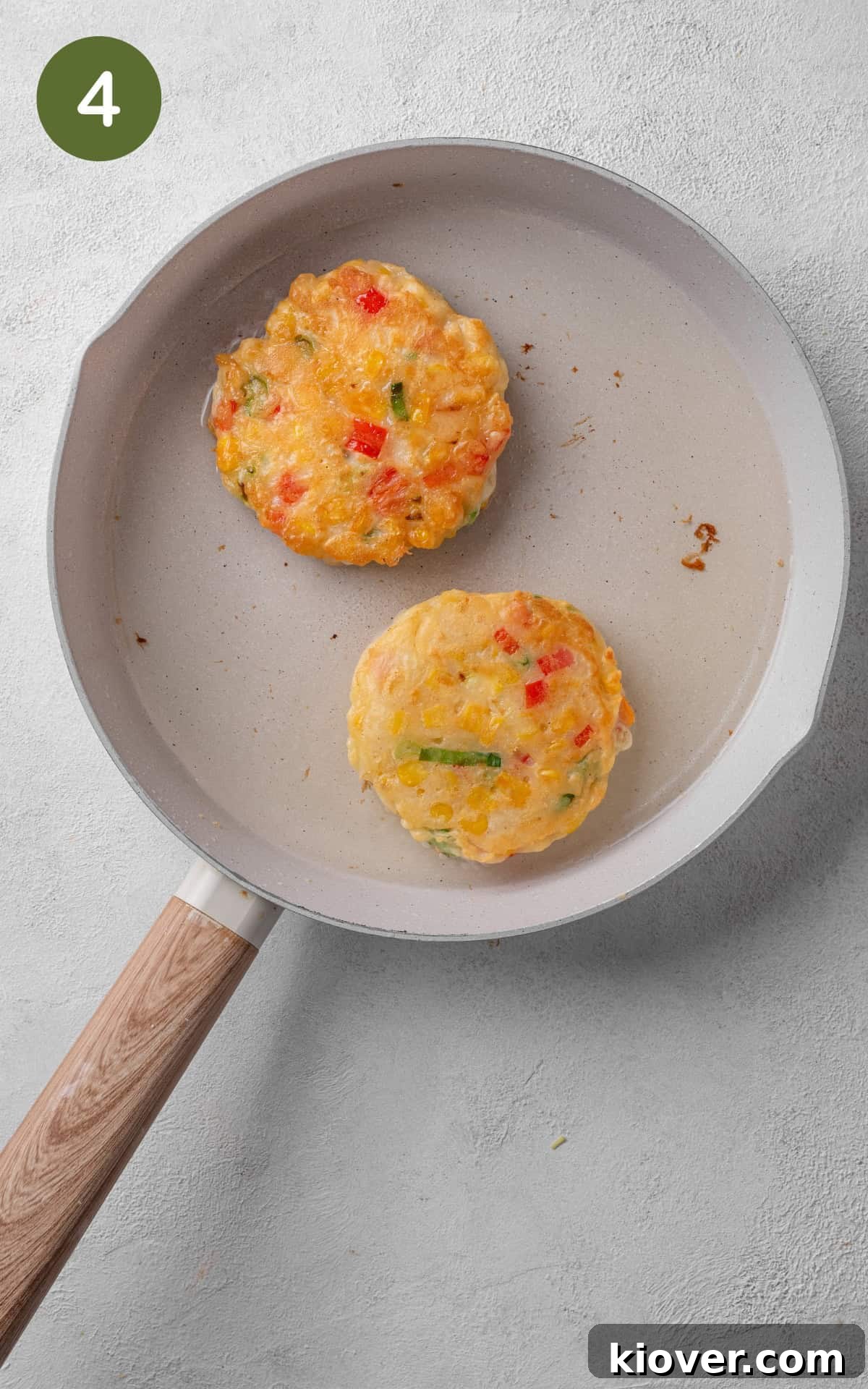 frying the fritters on a skillet.