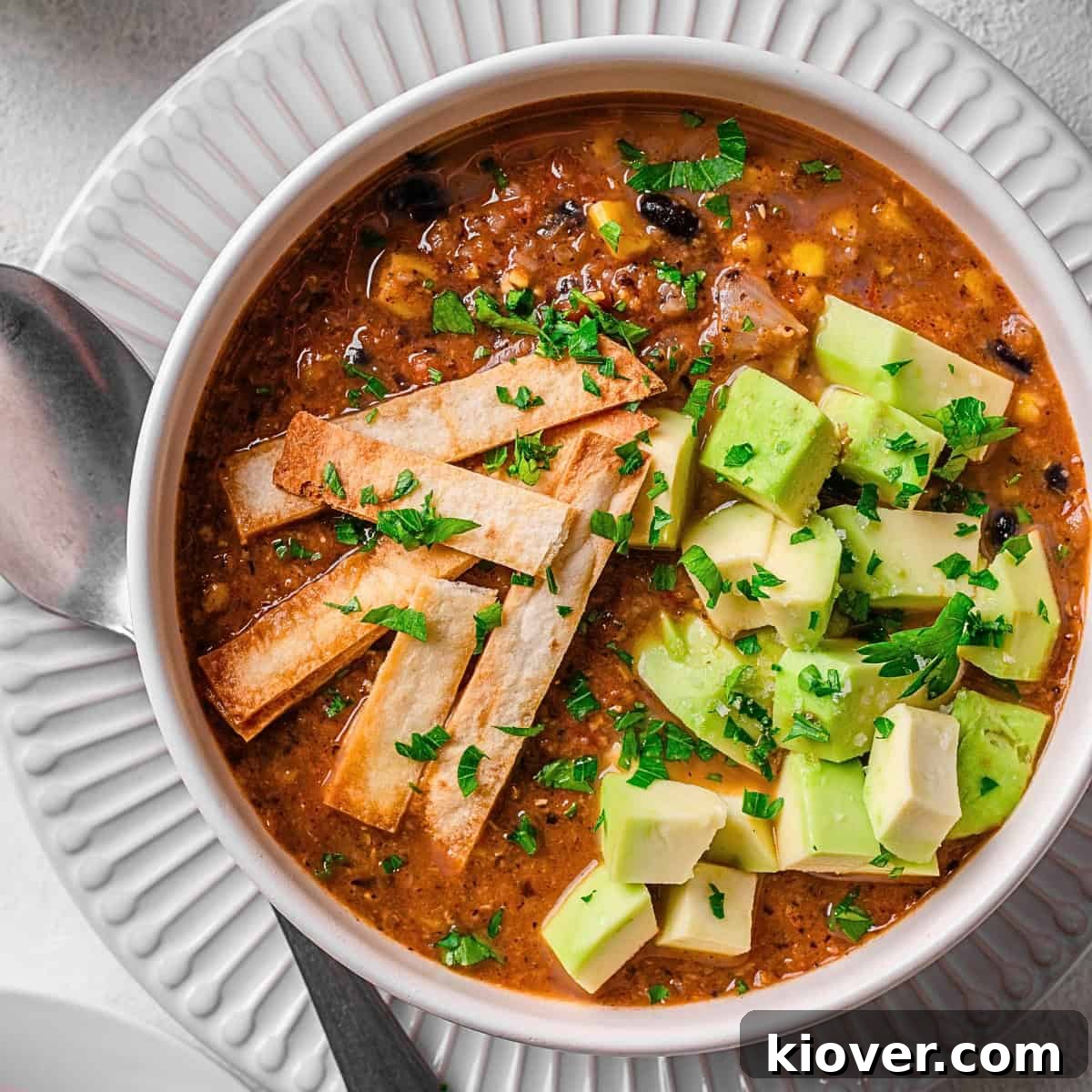 Authentic Mexican Soup Recipe: Flavorful Caldo de Res Guide 2 mexican soup with sliced avocado on top.
