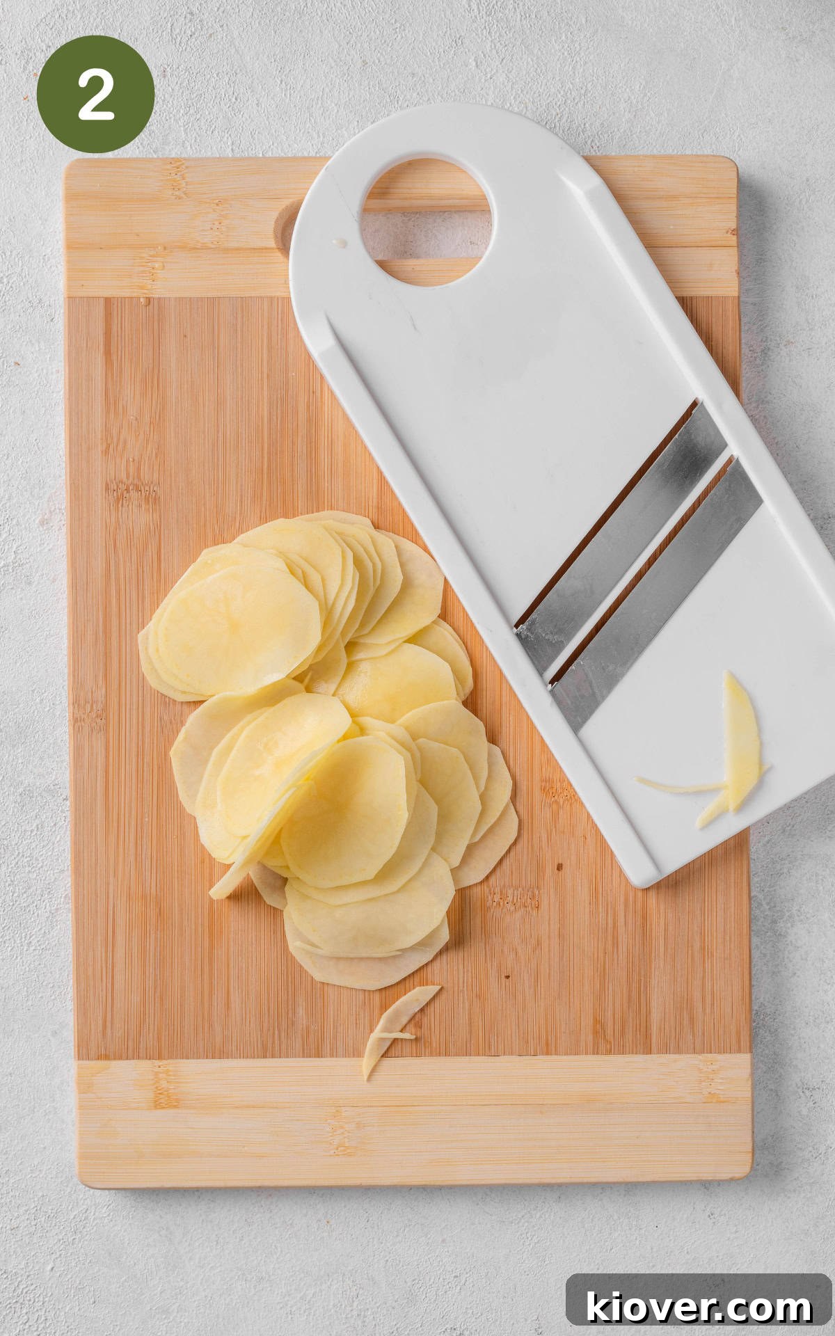 Classic Boulangère Potatoes Recipe: Crispy Potato and Onion Bake 5 sliced potatoes with mandolin slicer.