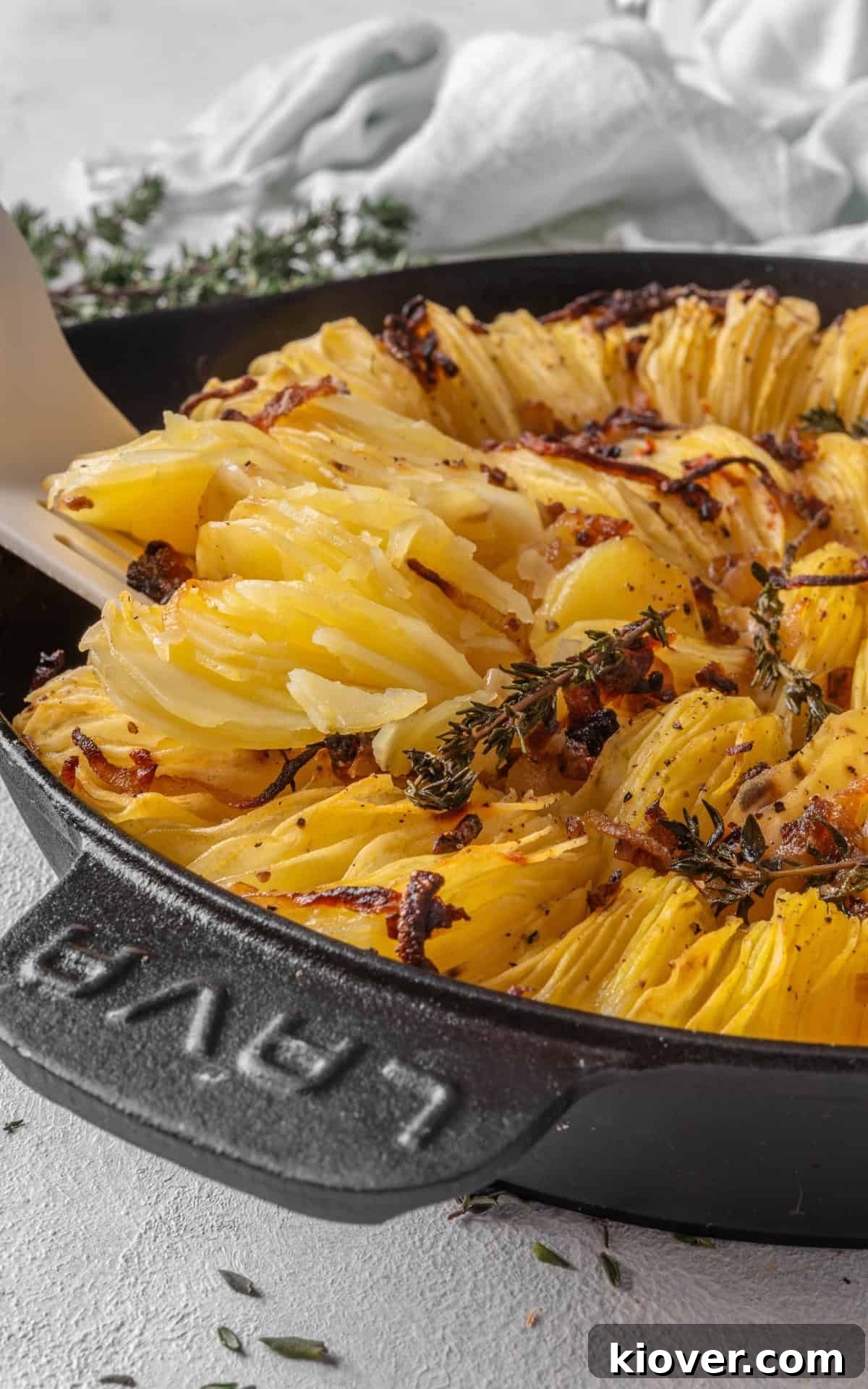Classic Boulangère Potatoes Recipe: Crispy Potato and Onion Bake 9 boulangere potatoes baked with onions and fresh thyme.