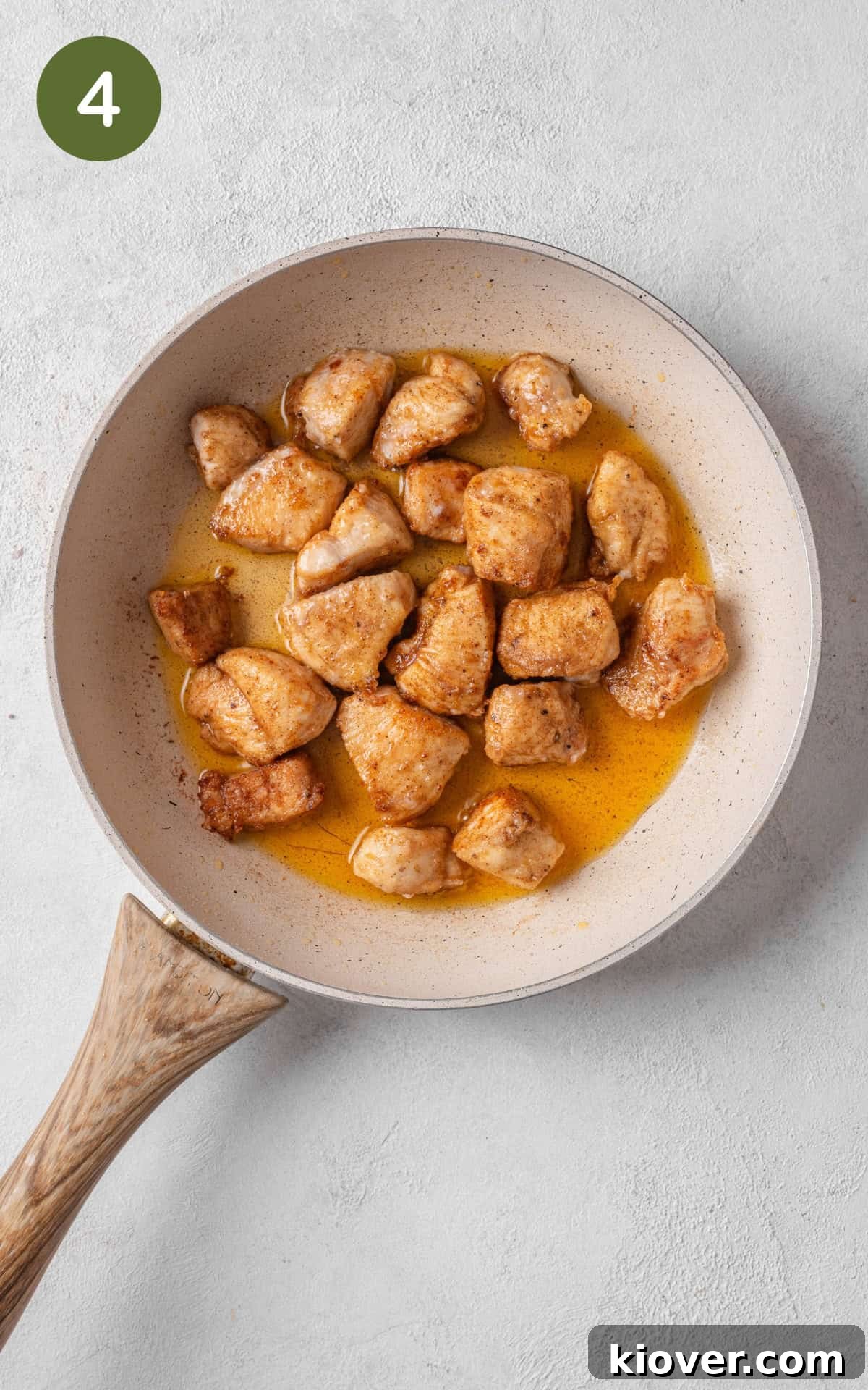 Crispy Salt and Pepper Chicken Recipe for Perfect Weeknight Dinner 7 frying chicken in a pan.