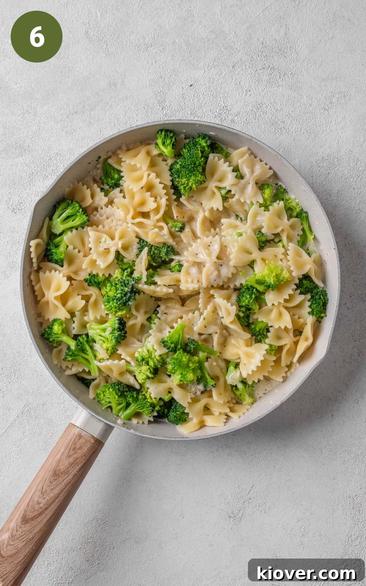 Creamy Garlic Broccoli Pasta with Parmesan 9 Pasta and broccoli in a skillet.