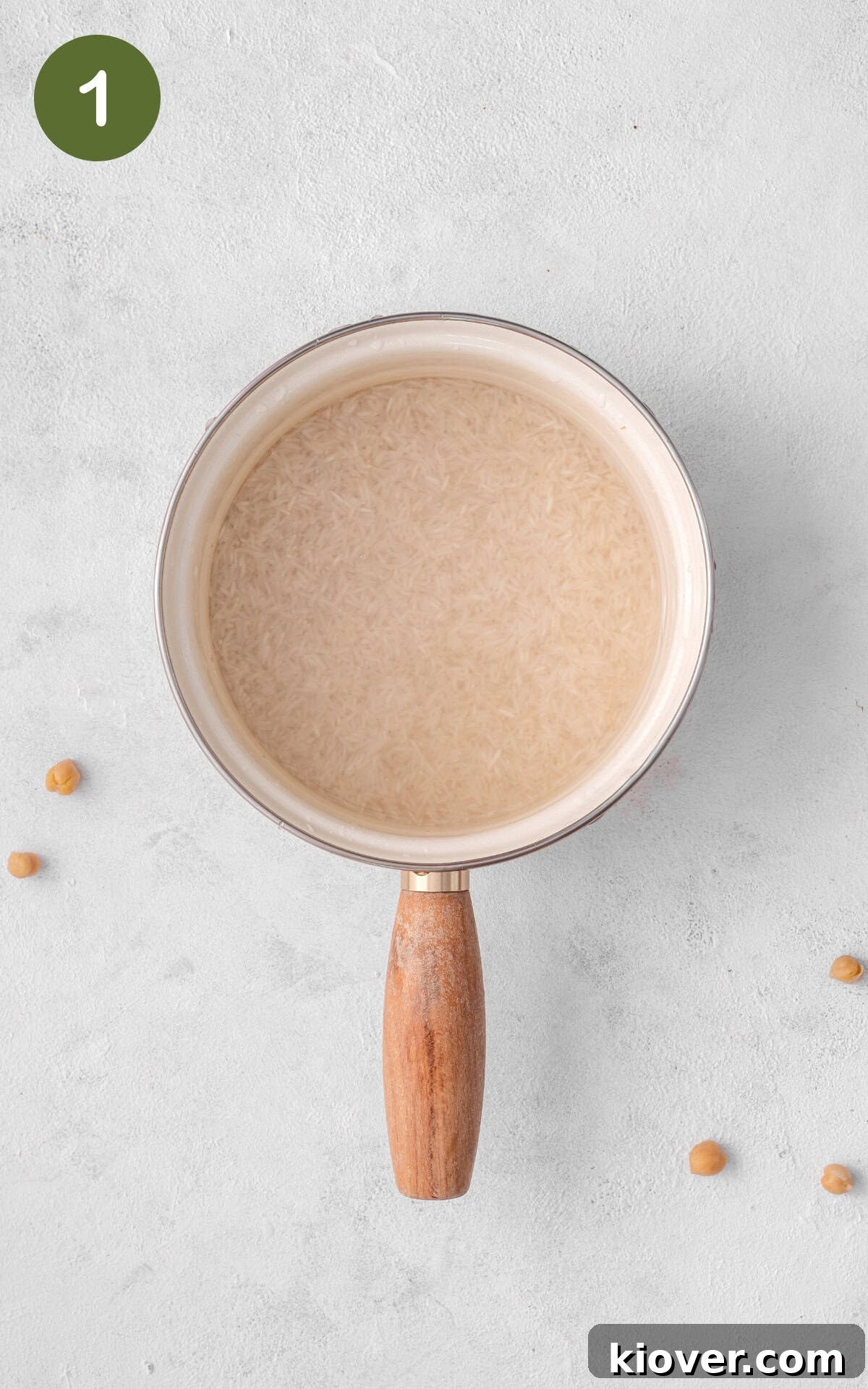 Rice cooking in a saucepan.