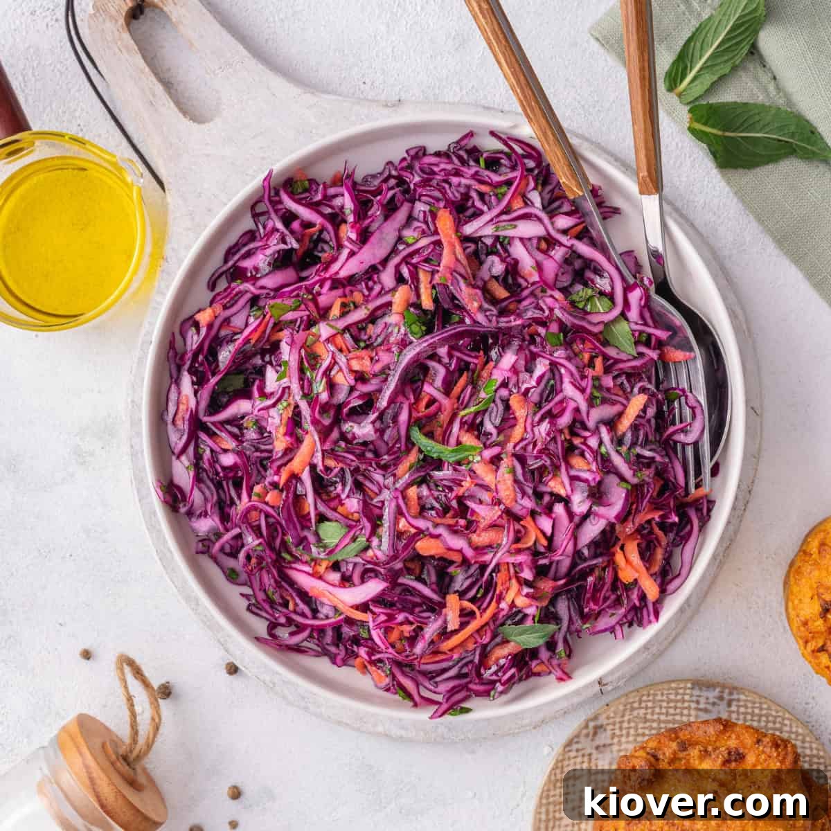 Red cabbage slaw salad served on a plate.